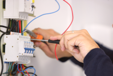 IMAGE: Electrician Installing